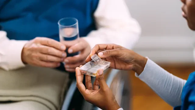 HCP: closeup patient medication 2184430243