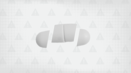 Gray background with texture and warning sign pattern. In the center is an oblong white pill cut into thirds.
GoodRx Health