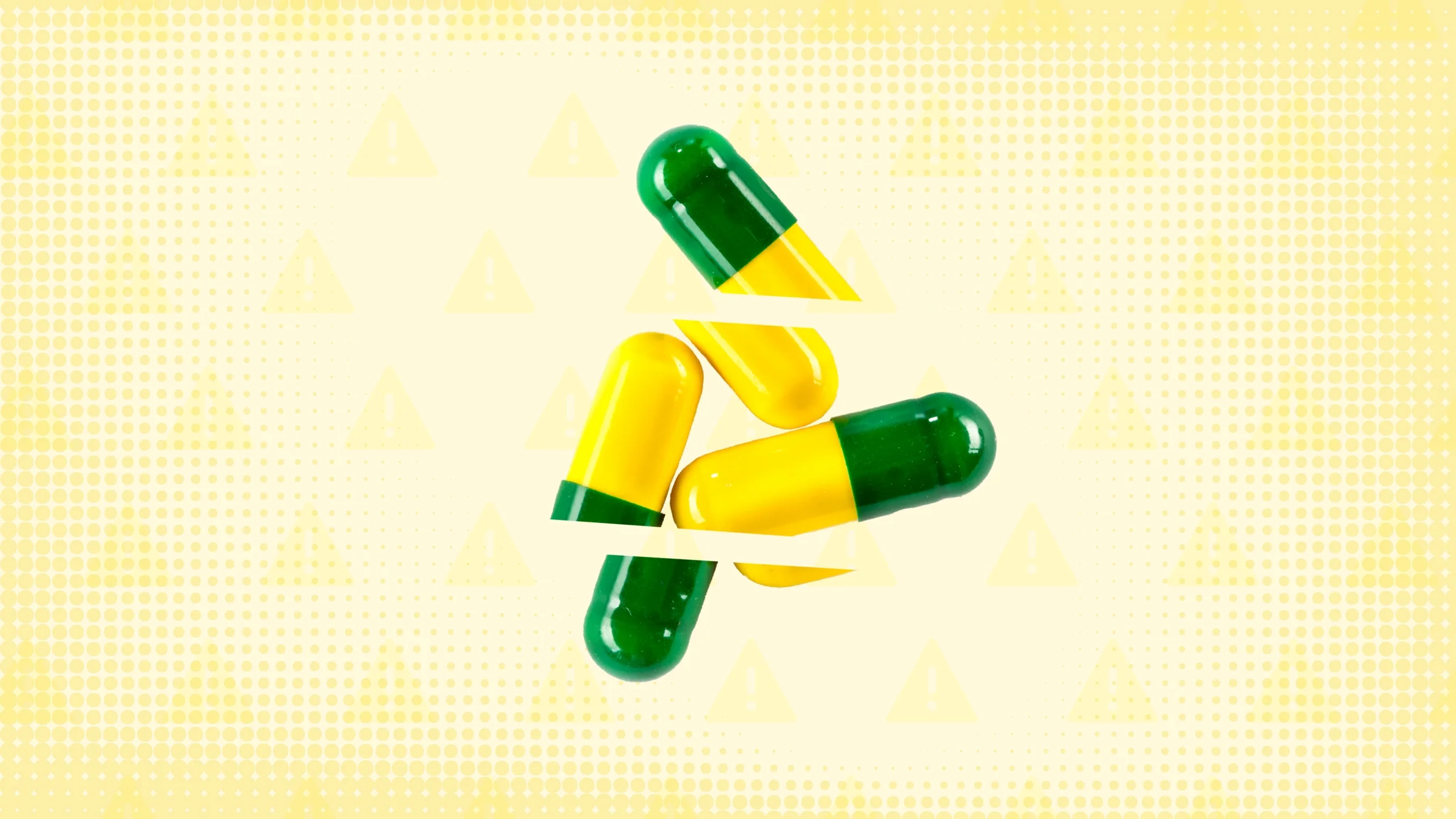 Bright yellow background with texture and warning sign pattern. In the center are three yellow and green capsule pills cut into thirds.
