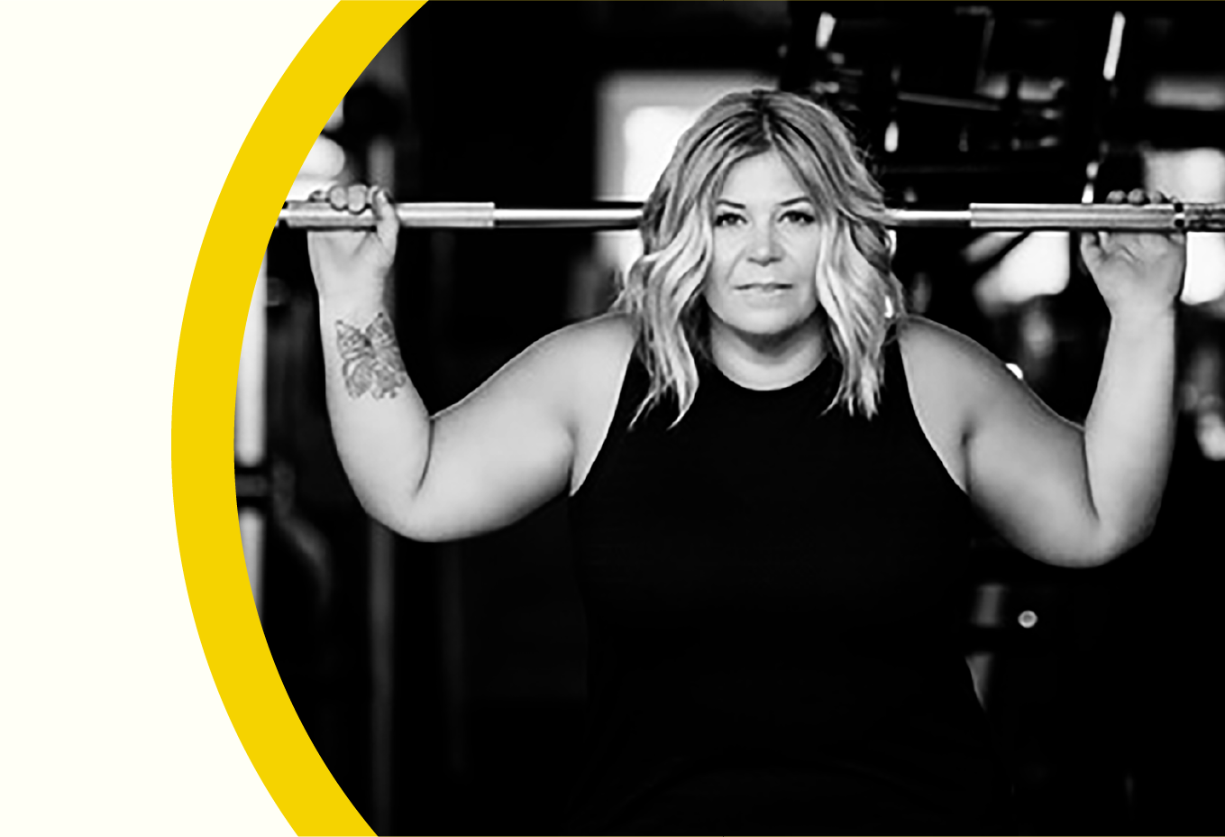 Black and white portrait of Louise Green at the gym.