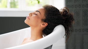 Alternative Treatments: woman hot bath 1262451386