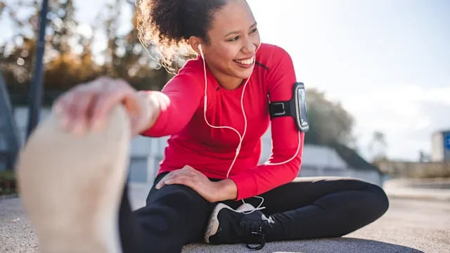 movement-exercise: running: exercise: woman workout stretching 1062457690
