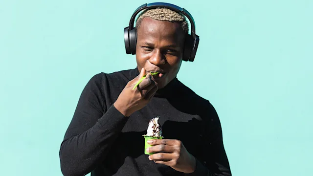 diet-nutrition: man eating soft serve 2171172321