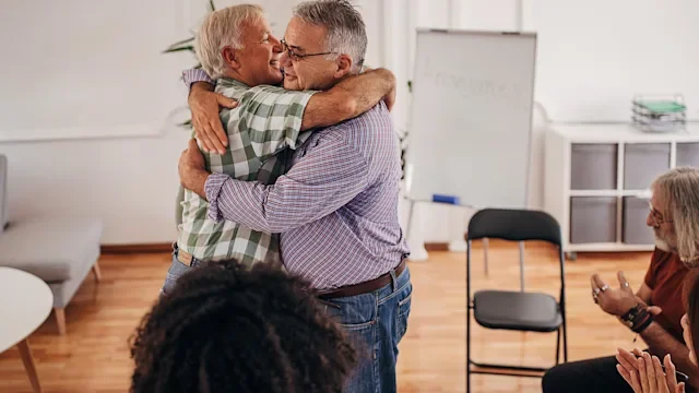 Health: Alcohol use disorder: mens support group hug 1338662006