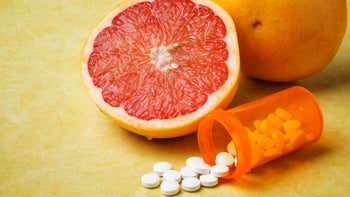 Statins: grapefruit spilled pills-168763130