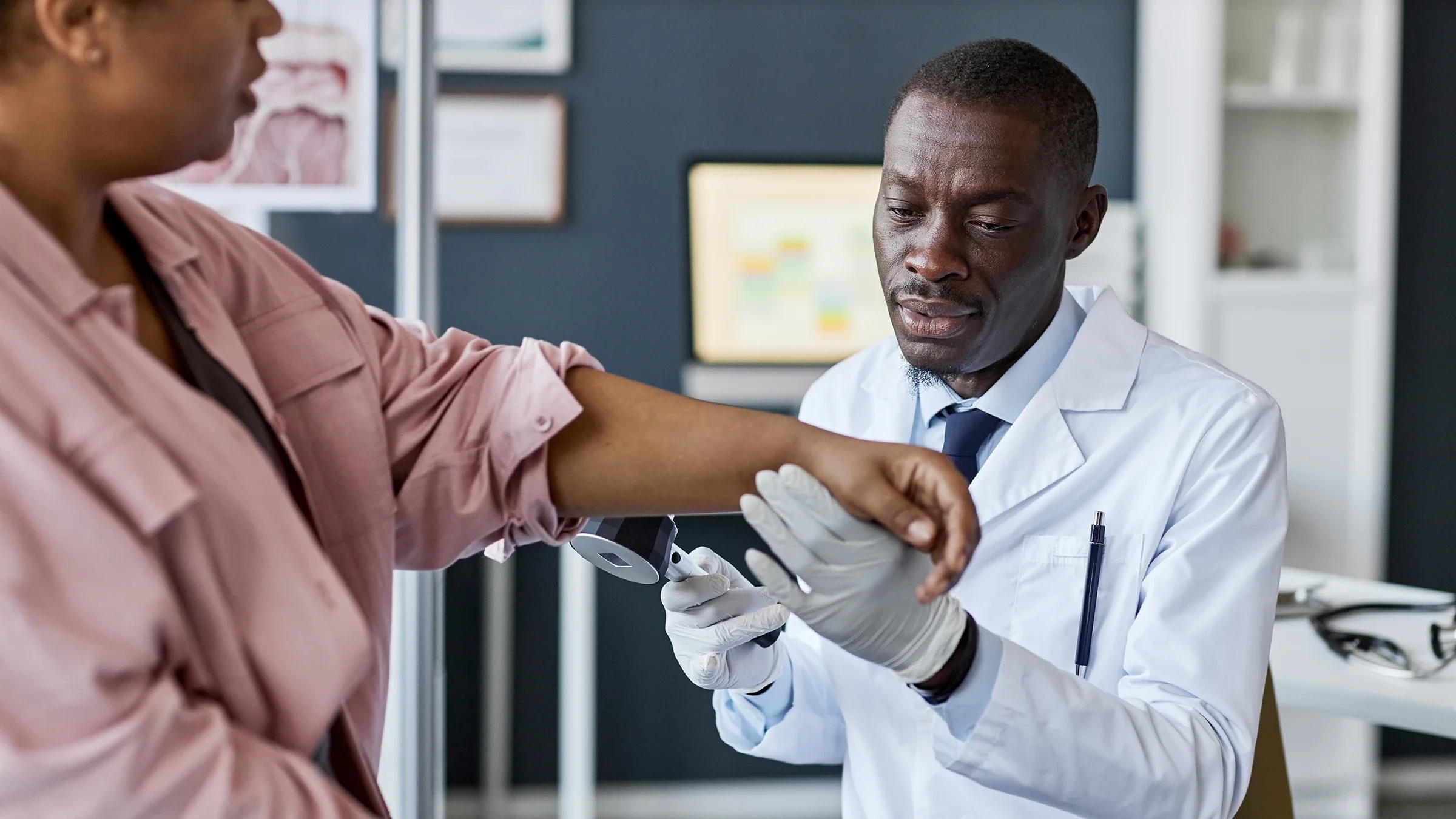 HCP examining patient's arm