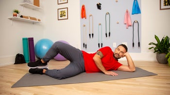 movement exercise: man doing clamshell exercise GOODRX NICK CielitoMVivas 2400