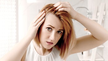 spironolactone: thinning hair woman concerned 1320296796