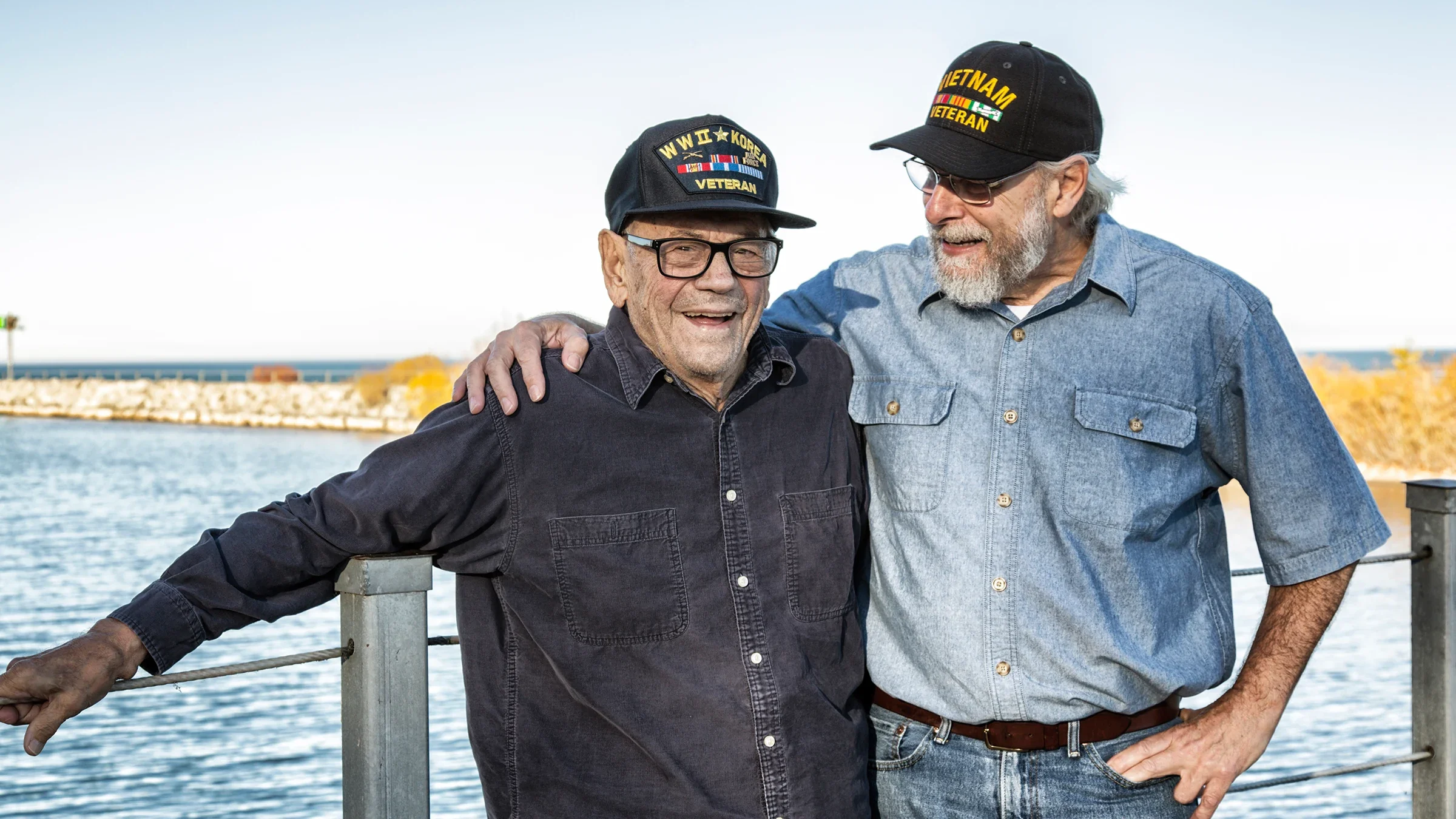 Health: Hepatitis C: portrait of two veterans on the water-827830192