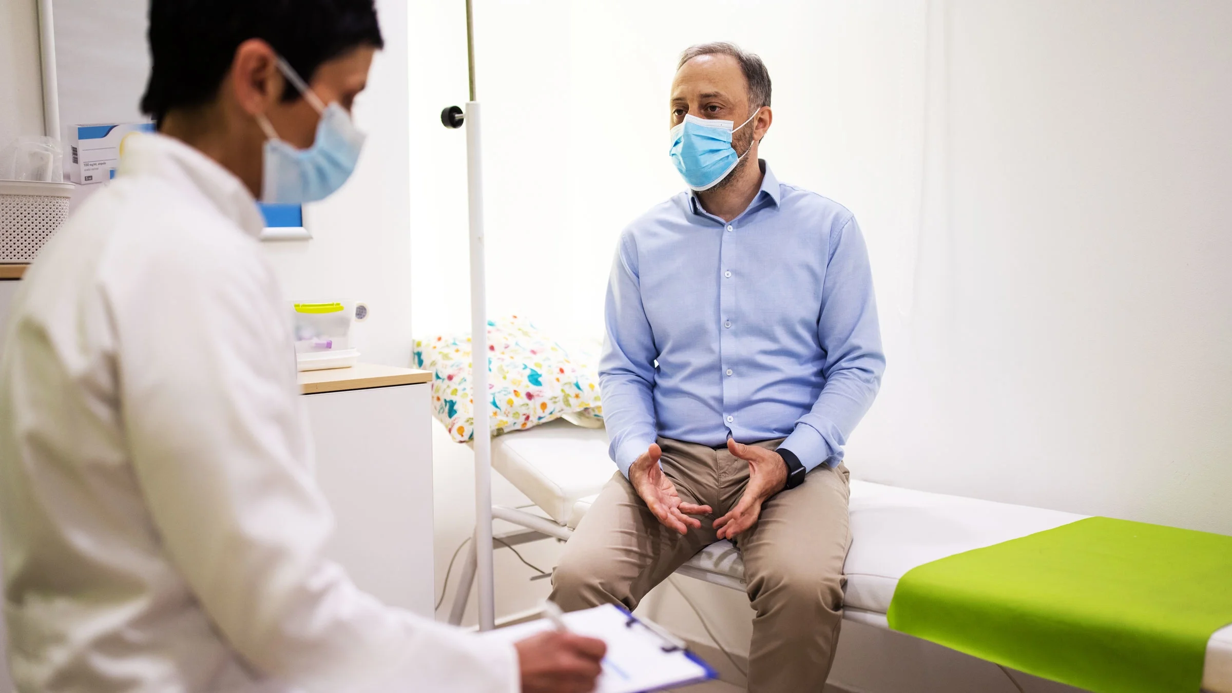 A man is at a healthcare appointment.
