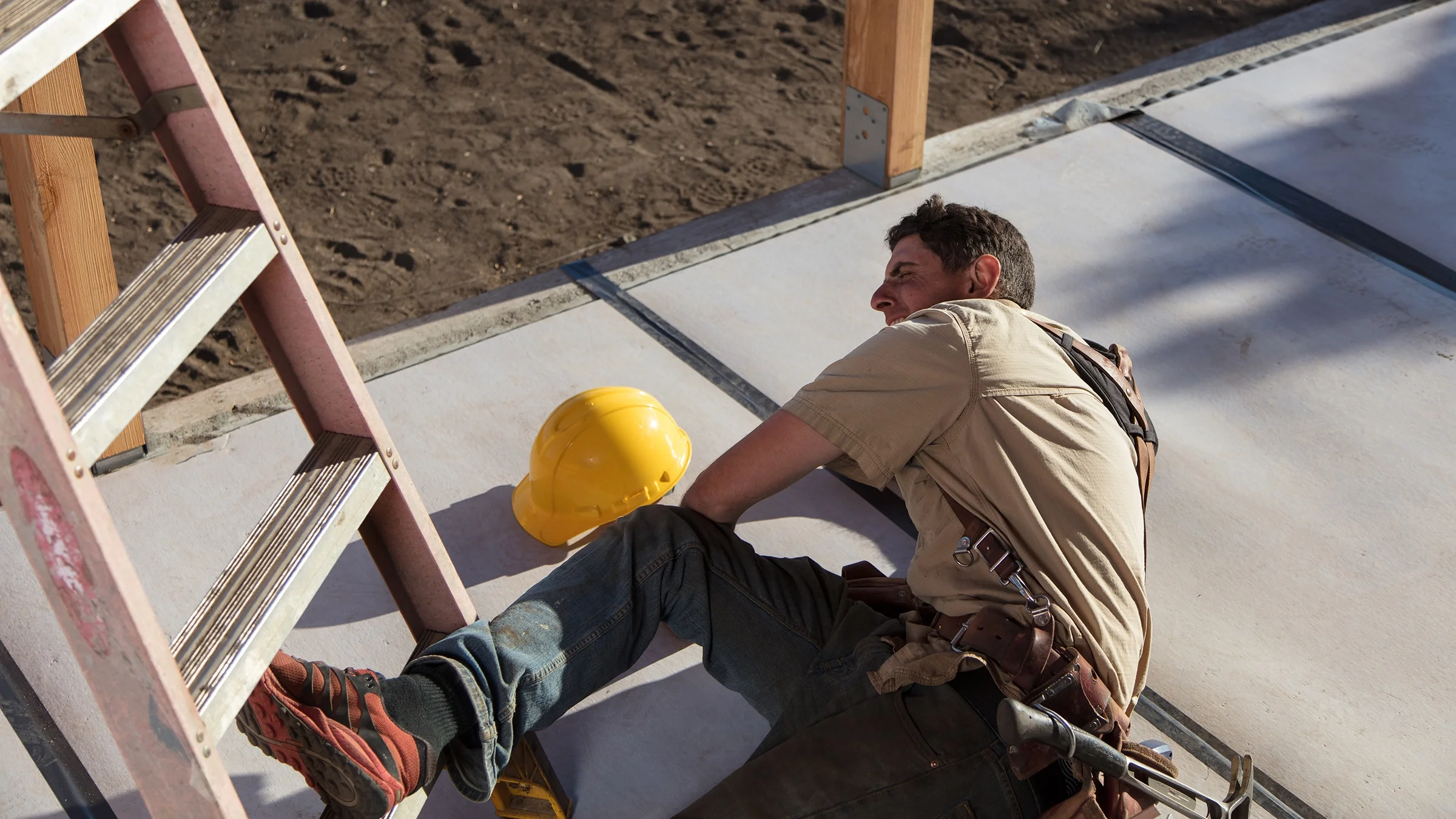 Man fallen on the job at a construction site.