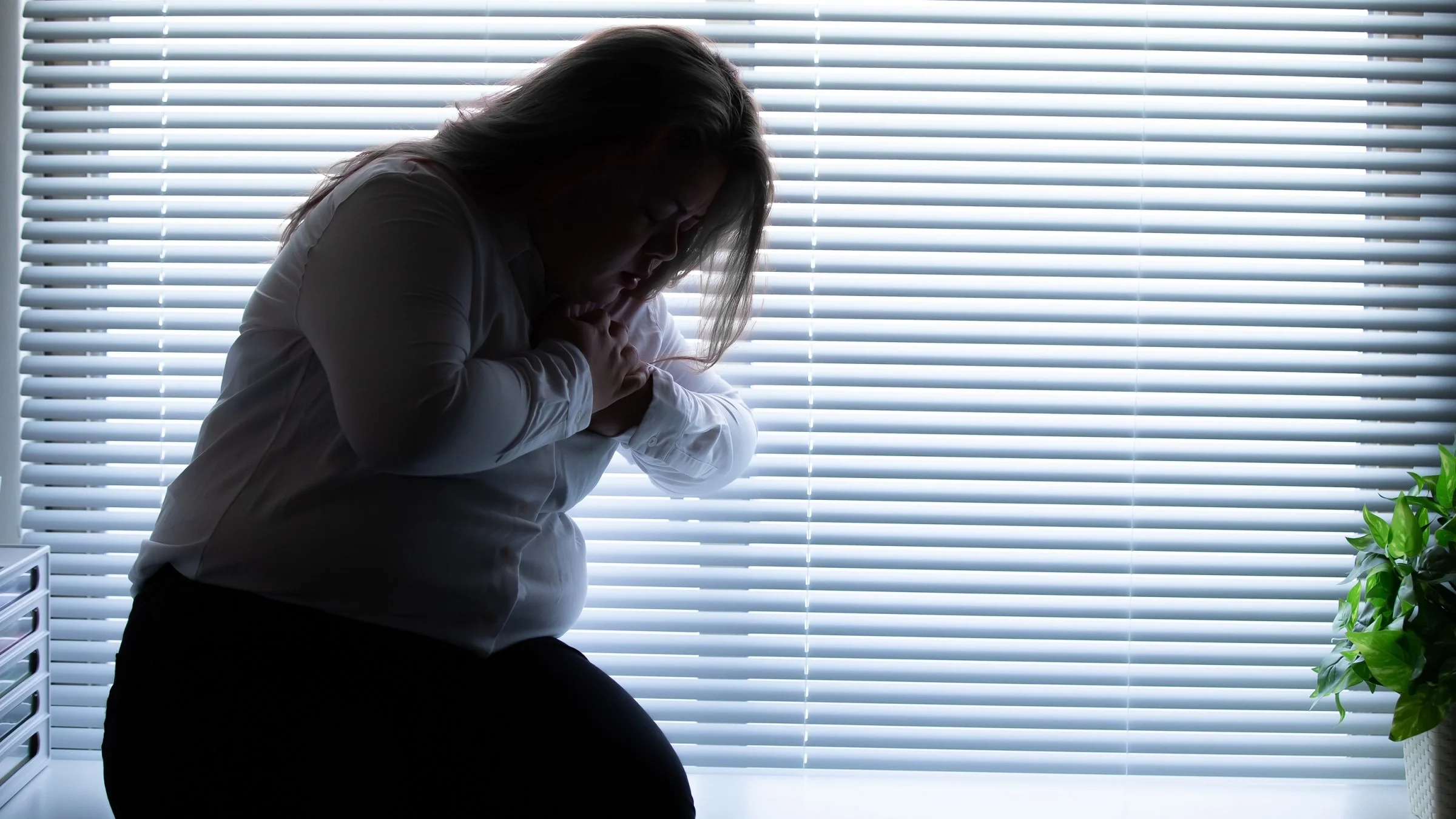 A person experiencing chest pain.