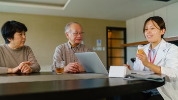 Health: Chlorthalidone: senior couple reviewing medications with doctor-1312567779