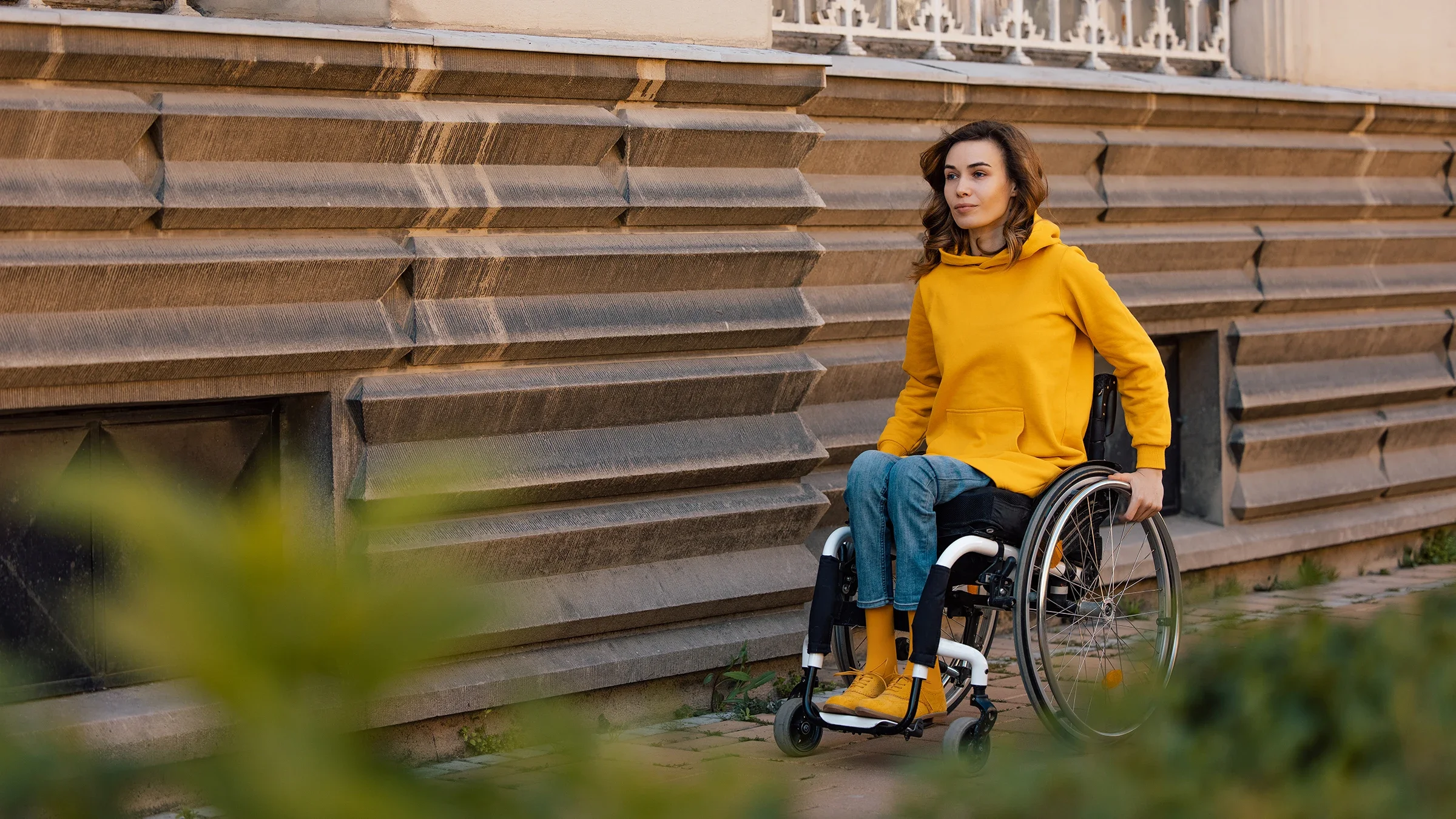 HCP: Ableism: woman in wheelchair outdoors 1327494108