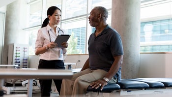 Senior Health: senior man at medical appointment 1184631605