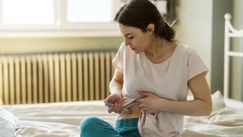 woman ozempic injection 2206699807