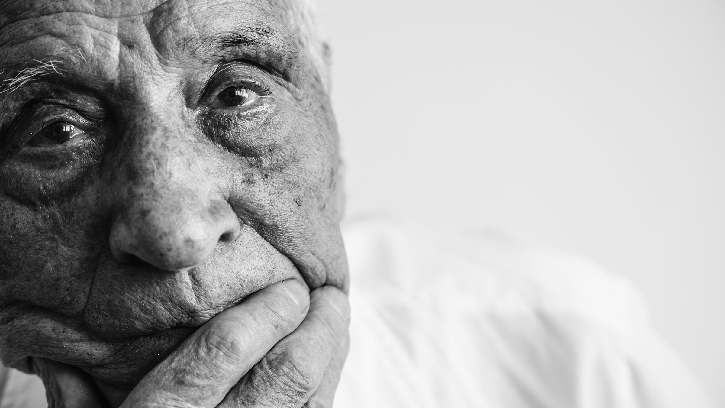 alzheimers-disease: black and white portrait old man-1169775666