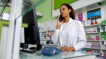 Pharmacy: pharmacy speaking on the phone 1778307444