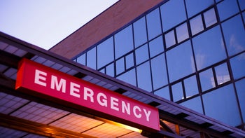 Health: Providers: emergency room sign on building-538726573