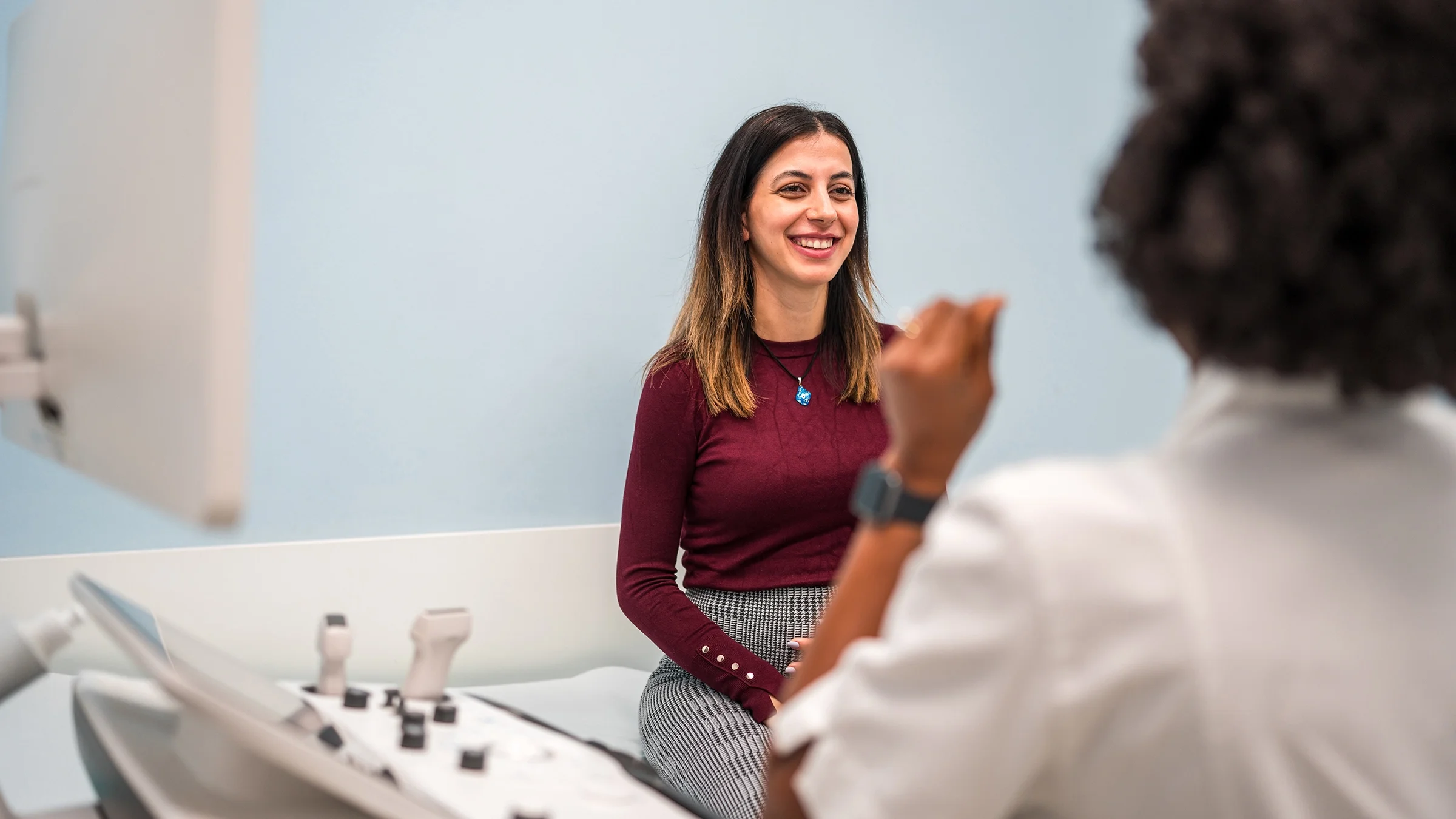 A woman attends a medical appointment.