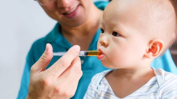 medication basics: giving oral medicine syringe 908985680