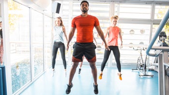 movement-exercise: group doing burpee exercise 1197919359