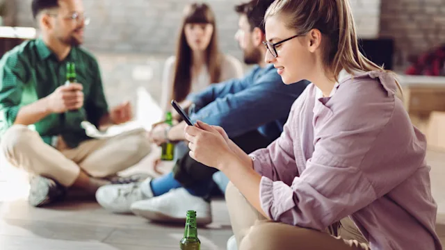 Central Nervous System Stimulants: Alcohol: using phone beer bottle 1489795189