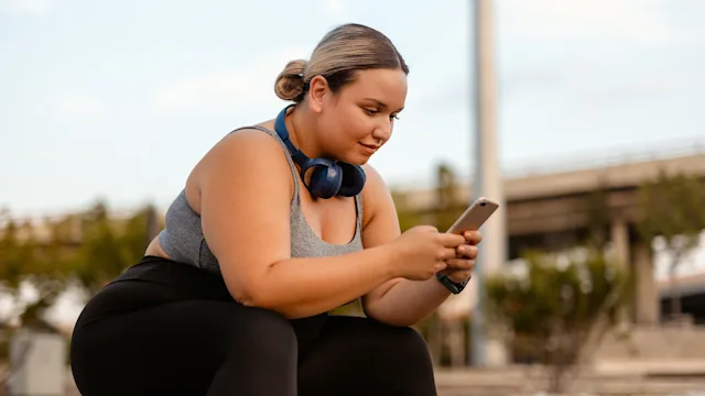 Movement Exercise: woman using mobile phone 2283829484