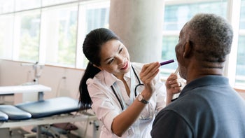 Health: Cold symptoms: doctor patient sore throat 1182464930