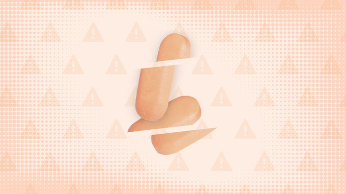 Light peach background with texture and warning sign pattern. In the center are orange-peach pills cut into thirds.