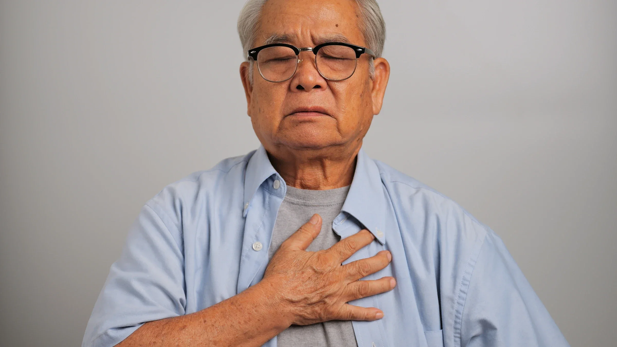 A man takes a deep breath.
trumzz/iStock via Getty Images Plus