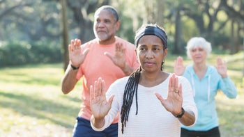 movement-exercise: tai chi in park-823634738
