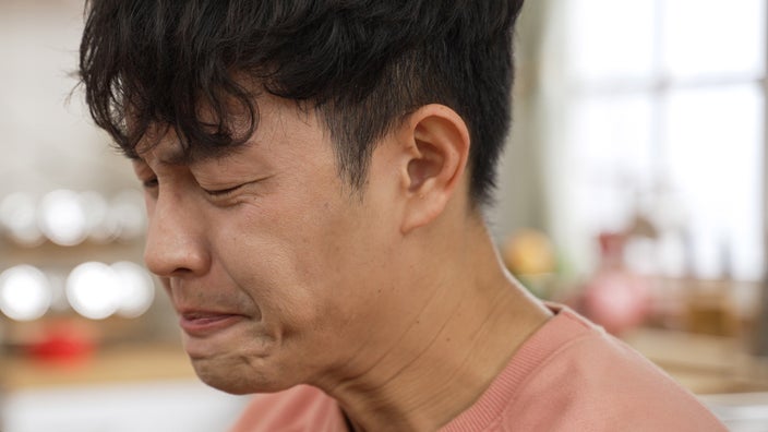 A person with a grossed out expression.