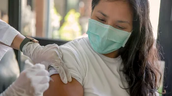 Health: Hepatitis B: closeup woman getting a shot-1321603204