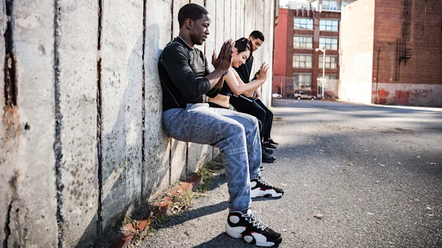 Movement-exercise: wall sitting exercise 494710292