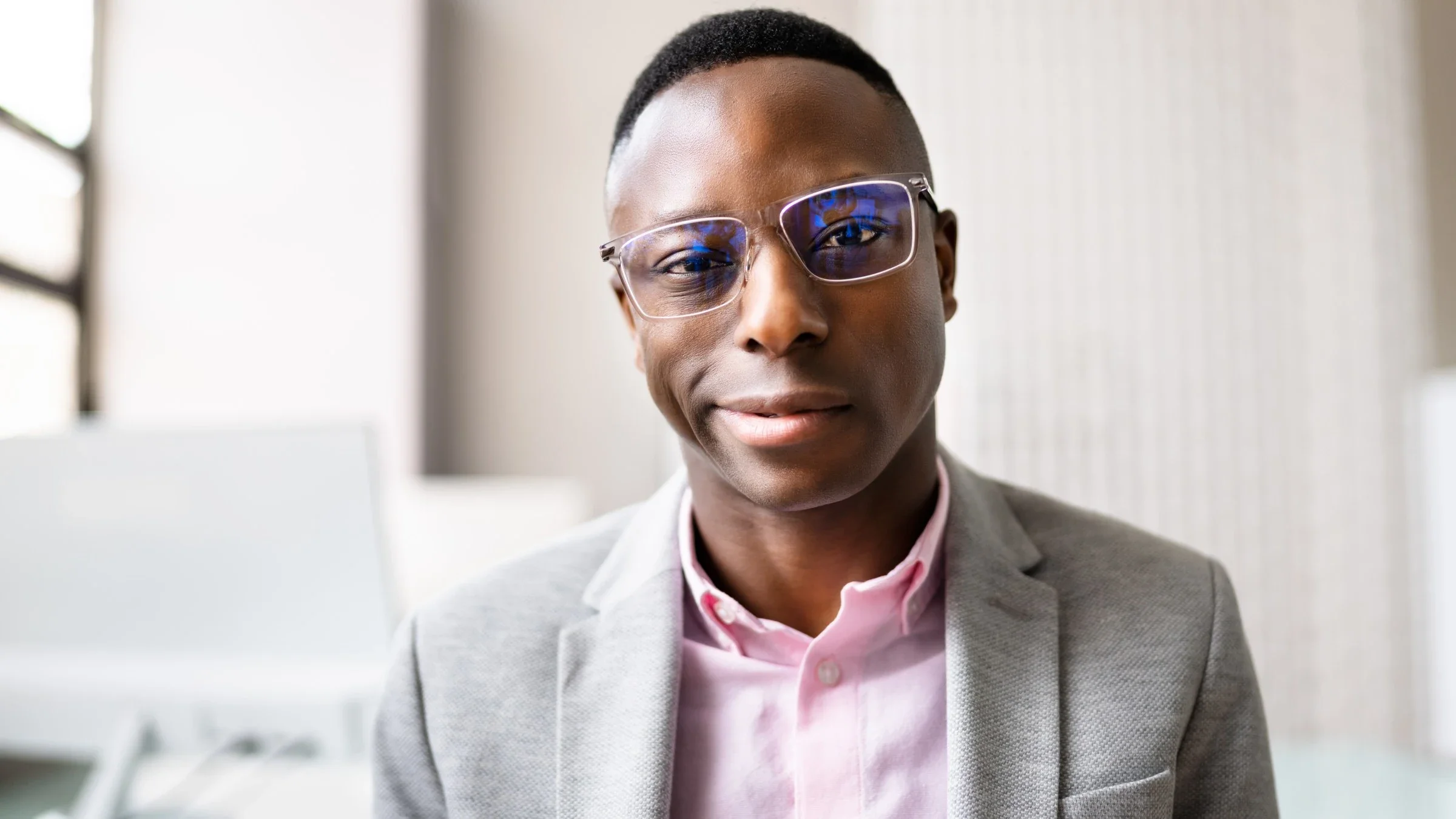 Close-up portrait of a man with clear glasses.
AndreyPopov/iStock via Getty Images