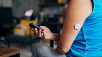 Health: Diabetes: cropped shot in arm glucomotitor-1334616881