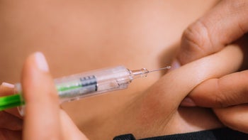 close up abdominal injection 1308446922