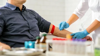 A close-up image shows a nurse disinfecting an arm before a blood test.
YakobchukOlena/iStock via Getty Images Plus