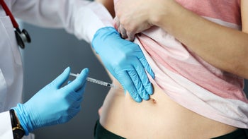 Sunlenca: closeup injection stomach 1287581740
