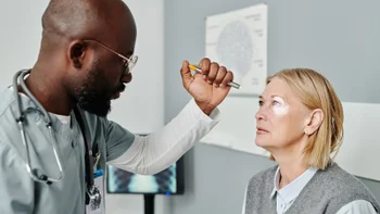 Semaglutide blindness: Woman at eye exam 1391164235