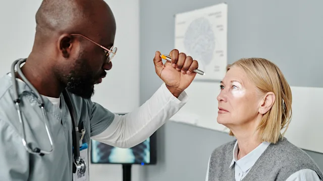 Semaglutide blindness: Woman at eye exam 1391164235