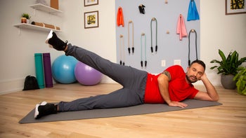 Movement-exercise: man doing side lyin leg lifts Cielito-M.-Vivas---GoodRx-Health 2400