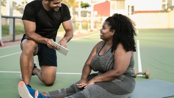 Movement exercise: Personal trainer cost: GettyImages 1328141635