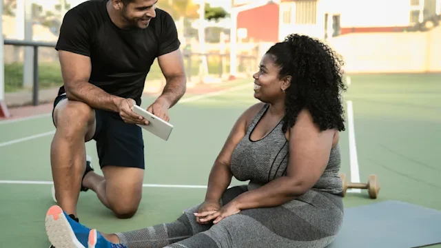 Movement exercise: Personal trainer cost: GettyImages 1328141635