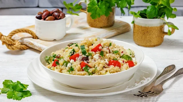 Diet-nutrition: bowl of quinoa with salad 2206626740