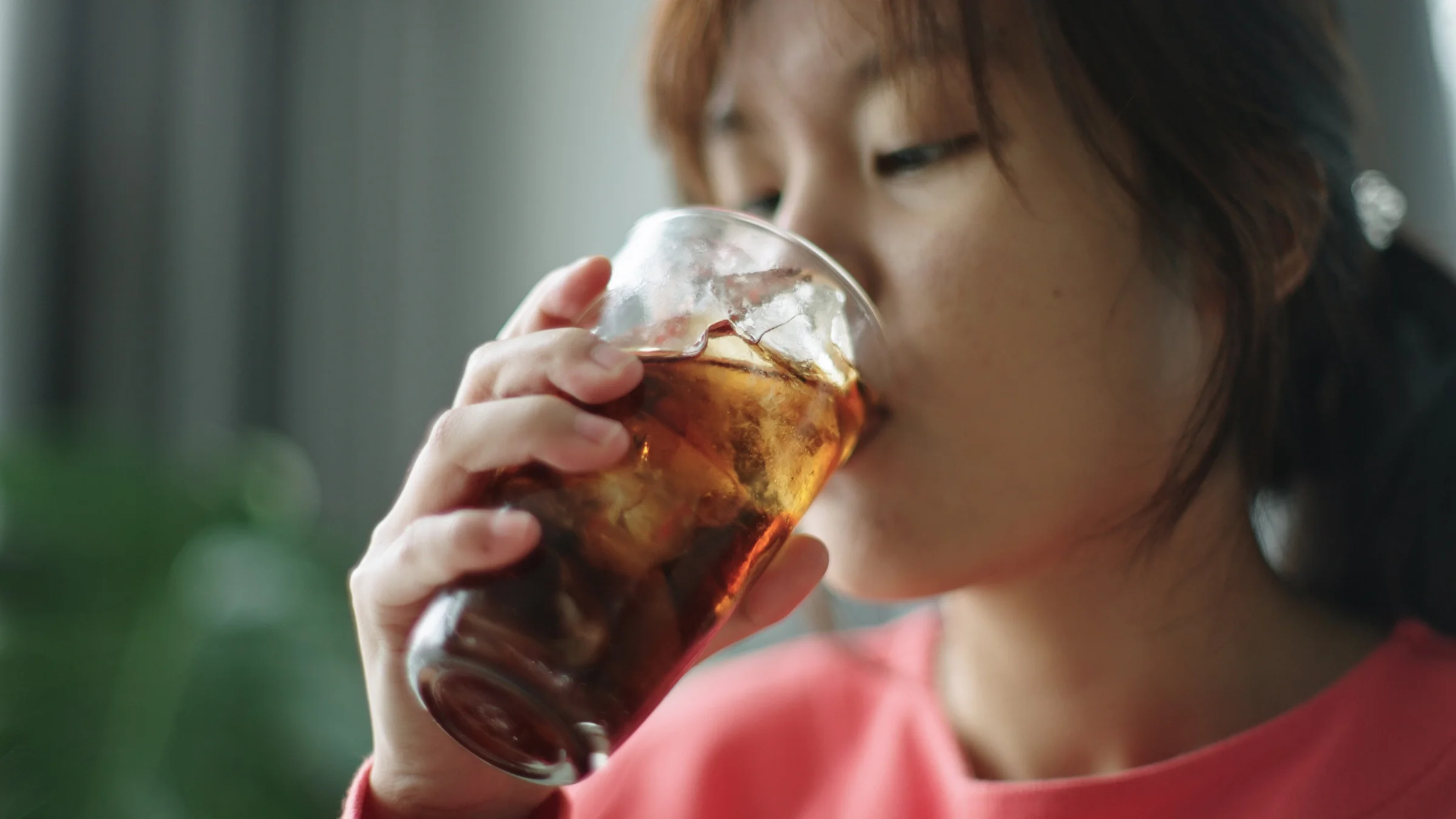 Person drinking cola