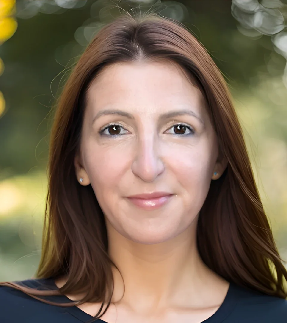 Val Martinez is pictured in a headshot.