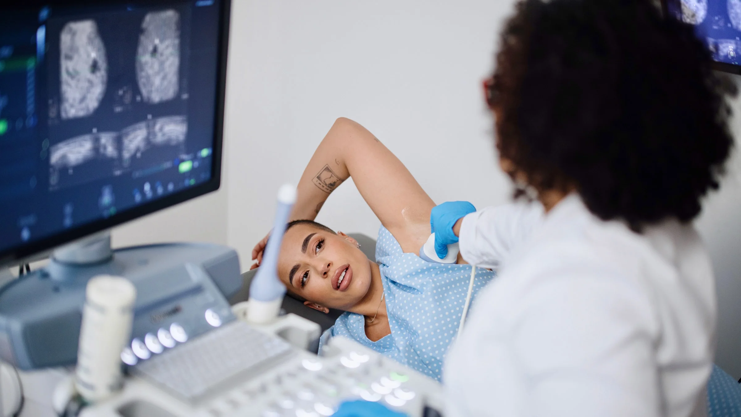 A patient getting a breast ultrasound exam.