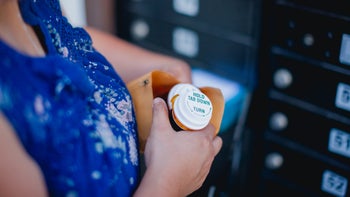 Farxiga: closeup woman mail ord prescriptions 1415058581